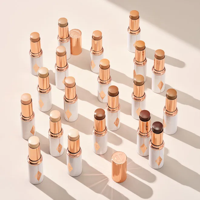 Тональные основы в стиках Charlotte Tilbury Unreal Skin Sheer Glow Tint Hydrating 